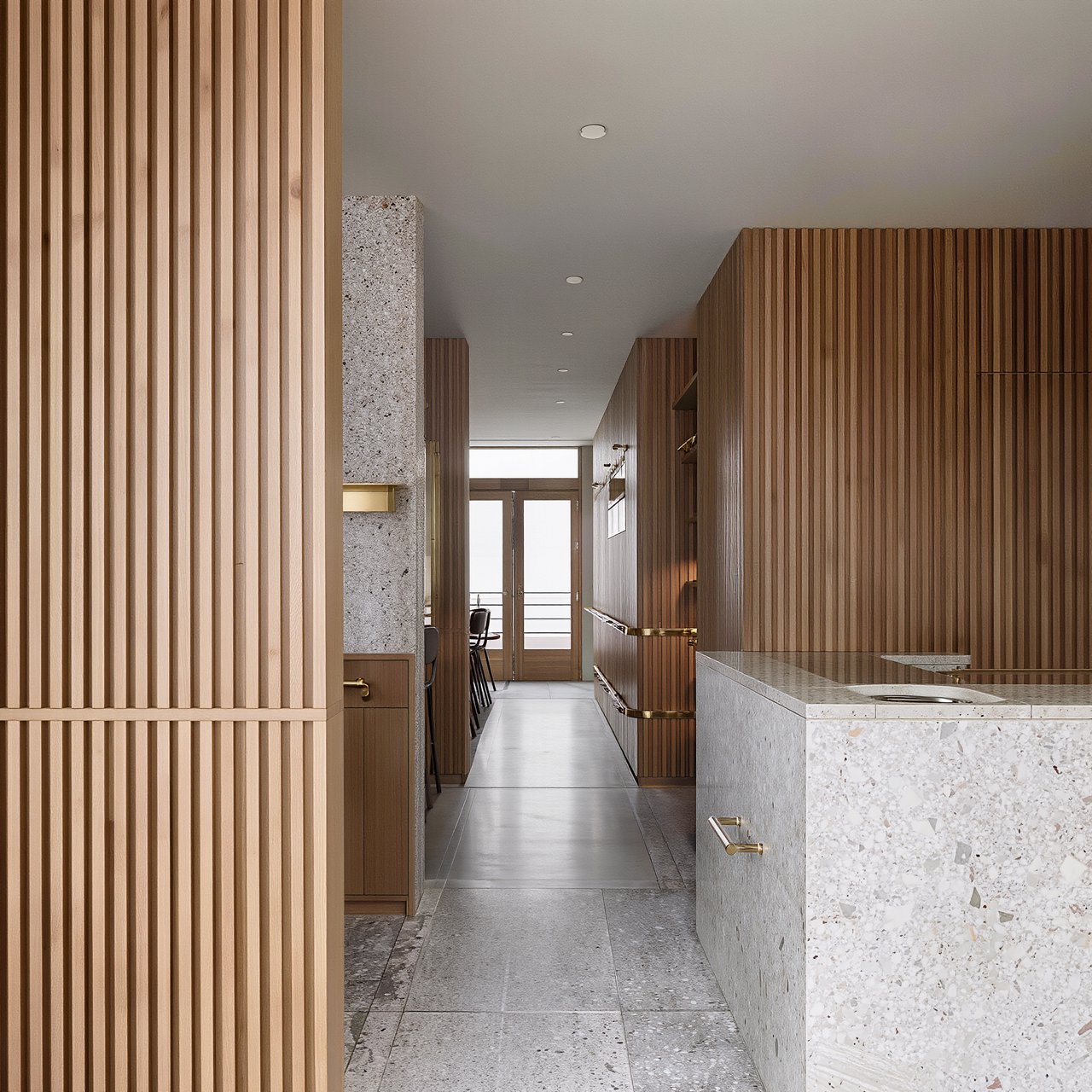 Inside an empty harbor café, restrained Danish modern design pairs ash slat screens, pale terrazzo, and brushed brass; overcast window light reaches the counter, viewed from the entrance, with aligned joinery and believable supports. — Kling v3