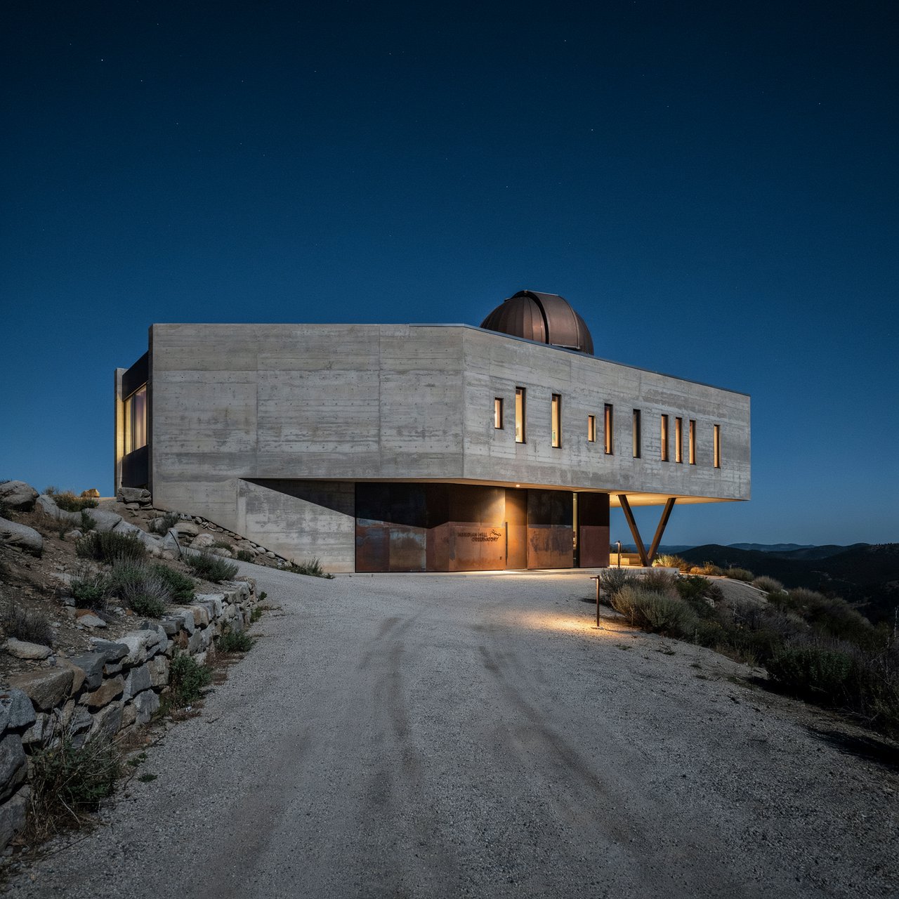 A hilltop observatory in spare contemporary architecture glows against the midnight sky, its pale concrete walls, bronze panels, and narrow windows lit from within; viewed from the access road, crisp edges and credible structural supports. — Ideogram v4