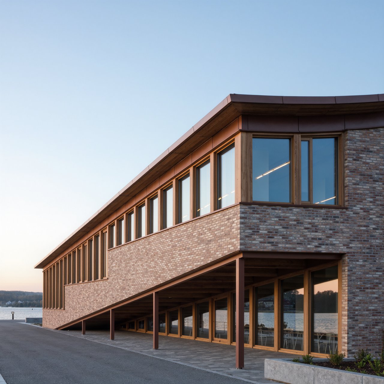 A riverside public library in contemporary Nordic brick architecture combines pale buff brick, oak-framed glazing, and a copper roof; cool morning light grazes its elevations, viewed from across the promenade, with straight lines and credible supports. — Kling v3 Omni