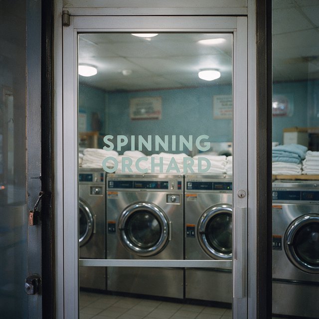 Inside a quiet neighborhood laundromat, chrome machines and folded linen glow beneath cool ceiling lights; "SPINNING ORCHARD" is printed in pale mint letters on the frosted glass entry door. — Seedream 5.0 Pro