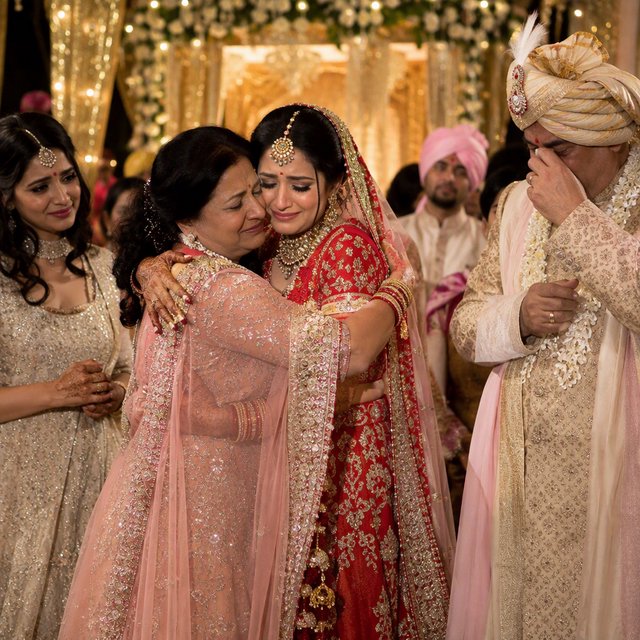 A realistic scene of an Indian wedding showing the emotions of the adult bride and her adult family members — GPT Image 2.5 Sunburst