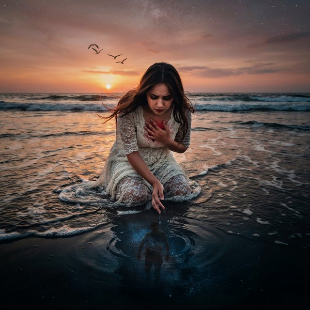 Cinematic, photorealistic artwork of a sorrowful young woman in a flowing ivory lace dress kneels in shallow surf at the waterline during sunset. Her long, windblown dark hair frames her downcast face; a tear flows down her cheek and into the water, one hand presses against her chest, glowing faintly crimson to suggest her still-beating heart, while her other fingertips touch the water. The world behind her remains beautiful: a golden sun shines over restless waves, seabirds cross the sky, and fiery peach clouds fade into star-filled indigo. In the wet sand, her reflection becomes a dark cosmic void. Stars ripple around a fading, ghostlike image of her partner deserting her and dissolving into darkness. The tear forms concentric ripples, disturbing an entire universe. Contrast warm golden life above with cool blue-black devastation below. Natural cinematic lighting, detailed water reflections, realistic anatomy, restrained grief. No text, borders, or collage. — Ideogram v4
