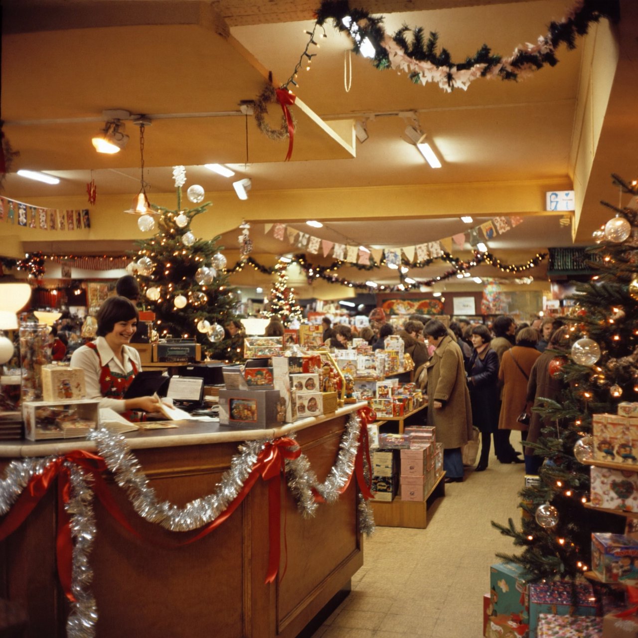 A UK department store in the 1970s at Christmas time. The lighting and decor will be very festive, with staff members dressed in festive outfits. — ImagineArt 2