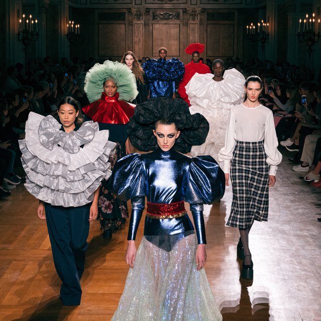 Adult female fashion models on the runway. There are models of all races: white, Black, Asian, Mexican, Indian, mixed race, etc. The vibe is cool and fierce. Many angles. — Recraft v4 Pro