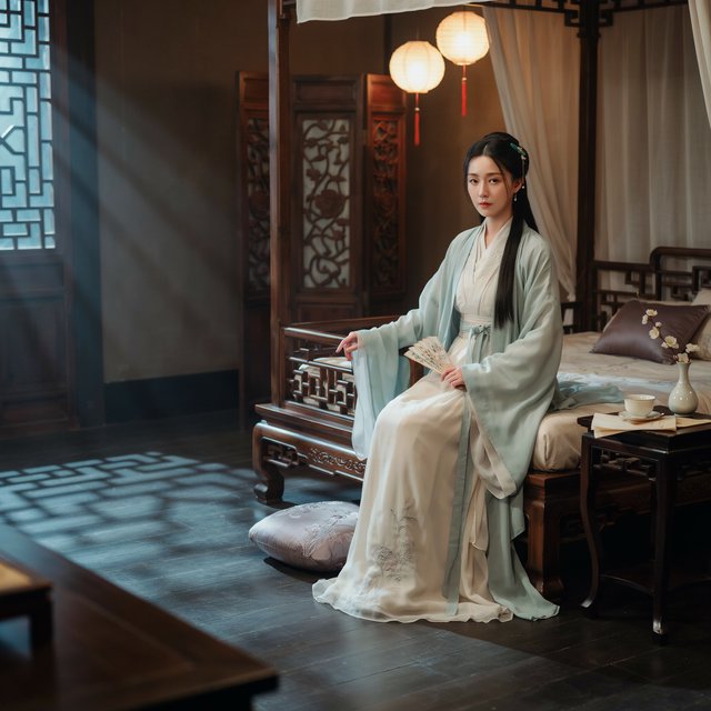 A beautiful adult Chinese woman in her 20s wearing an elegant, subtly sensual Song Dynasty–inspired hanfu with a loose off-shoulder neckline, gracefully exposing her shoulders and collarbones. She sits on an ornate wooden bed inside a refined ancient Chinese bedroom at night, surrounded by gauze curtains, carved screens and softly glowing lanterns. Moonlight filters through the lattice window, creating a romantic, intimate atmosphere. Luxurious silk fabrics, delicate hair ornaments, natural feminine pose, cinematic lighting, historically inspired details, tasteful and sophisticated. — Ideogram v4