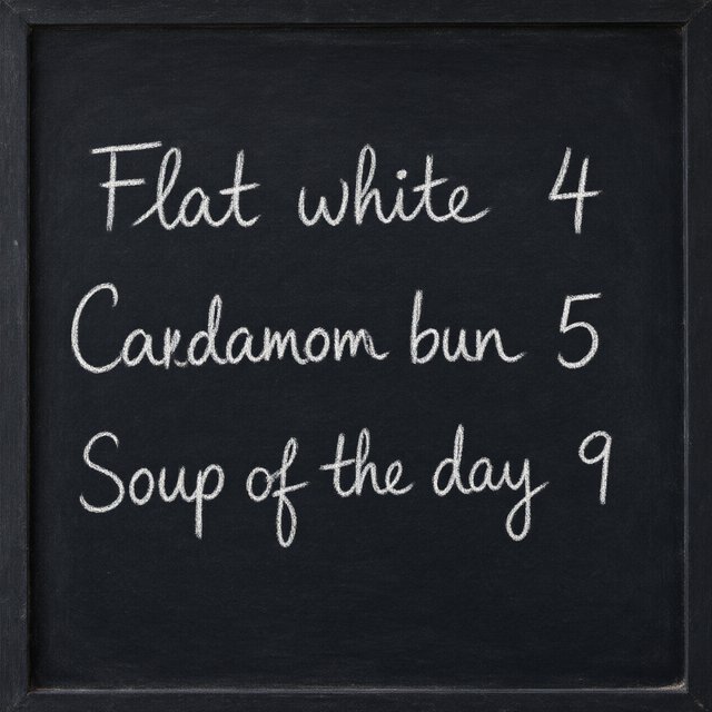 A café chalkboard listing exactly three items: "Flat white 4", "Cardamom bun 5", "Soup of the day 9", in neat chalk handwriting. — Qwen Image 3.0