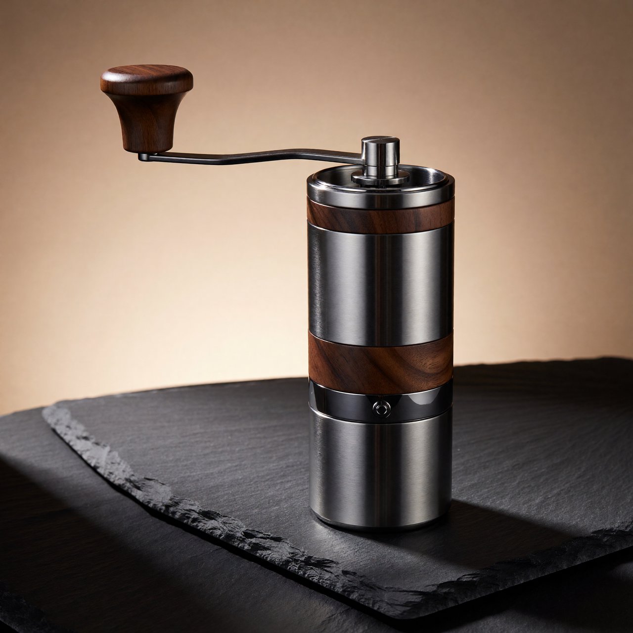 Commercial product photograph of an unbranded portable espresso grinder crafted from anodized aluminum with walnut accents, resting on a black stone surface against a warm beige background, illuminated by broad diffused studio light and a subtle edge highlight. — ImagineArt 1.5 Pro