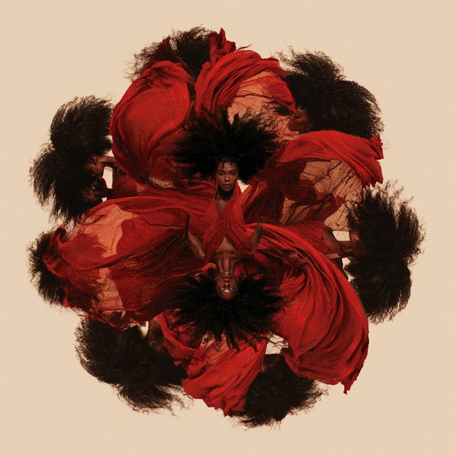 Image of a pop-dance African-American diva. The woman hangs completely inverted in mid-air, head pointing toward the floor and legs toward the ceiling. Her huge hair falls and spreads dramatically in the opposite direction, while her expression remains cool and composed. Her red gown is turned inside out, exposing its sparkling lining, seams, and construction. To push the surrealism further, a second, reversed version of her silhouette appears to peel outward from her original form, like a three-dimensional reflection escaping its owner. Multiple copies of the woman circle around a central point, each rotated to a different angle. Their flowing hair and red gowns form a pinwheel or circular vortex, creating the impression that one woman is spinning endlessly around herself. — Midjourney V8.2