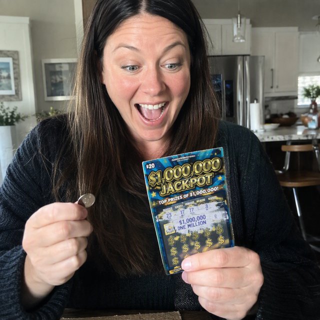 A realistic scene of a random adult person, either Black, white, or Asian, scratching a scratch ticket and discovering that they have won one million dollars. — GPT Image 2.5 Flare