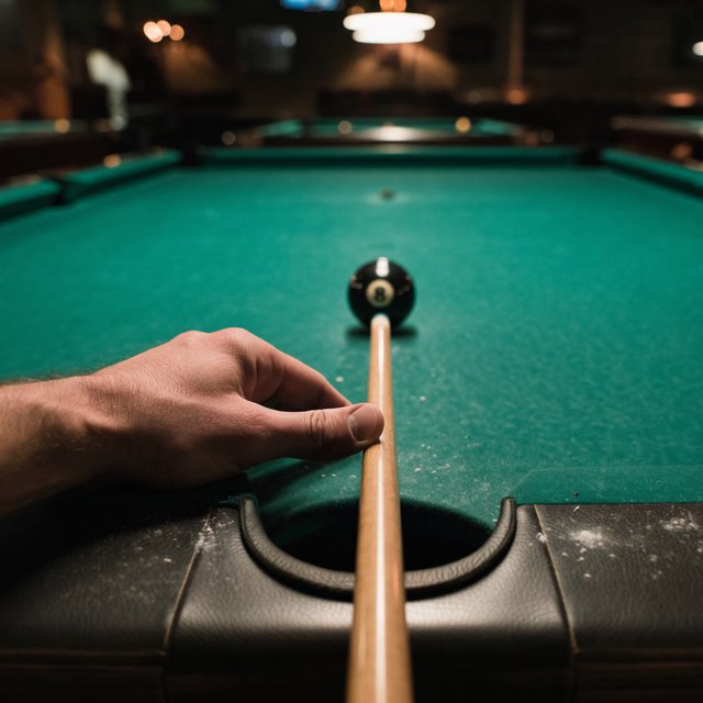 First-person perspective of an adult pool player’s left hand holding the cue, aiming the white cue ball at the black 8-ball and intending to pocket it in the center pocket. — ImagineArt 2