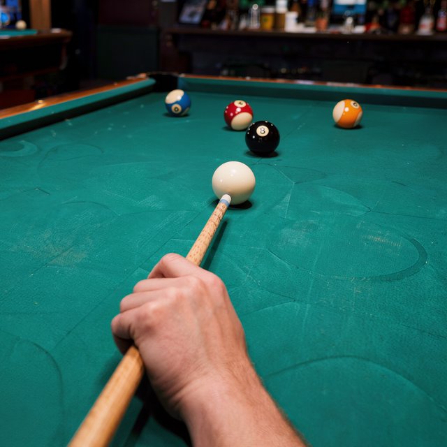 First-person perspective of an adult pool player’s left hand holding the cue, aiming the white cue ball at the black 8-ball and intending to pocket it in the center pocket. — Kling v3