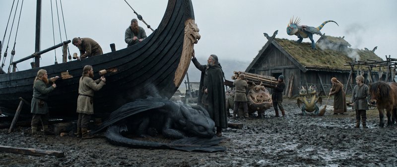 A medieval Viking ship being hauled ashore with people and a large black dragon-like creature on ...