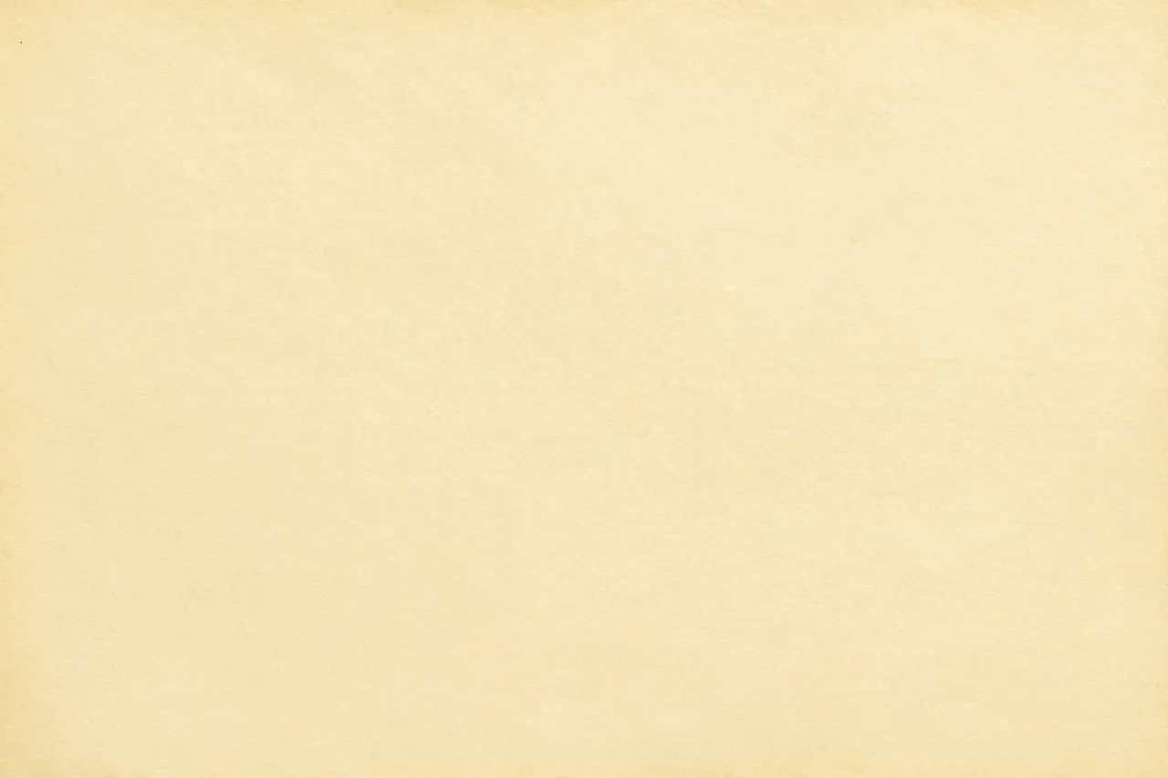 Full frame top view of a smooth pale yellowed old paper surface with subtle fibrous grain