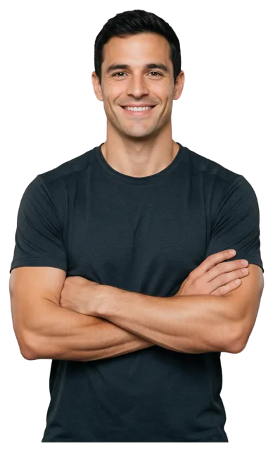 Athletic adult man in a charcoal t-shirt smiles warmly with his arms crossed looking at the camera