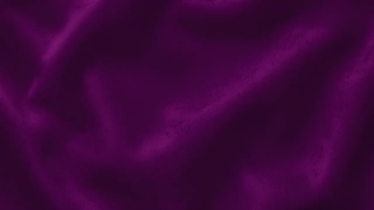 A smooth full frame aubergine velvet surface with soft undulations and a faint velvety sheen