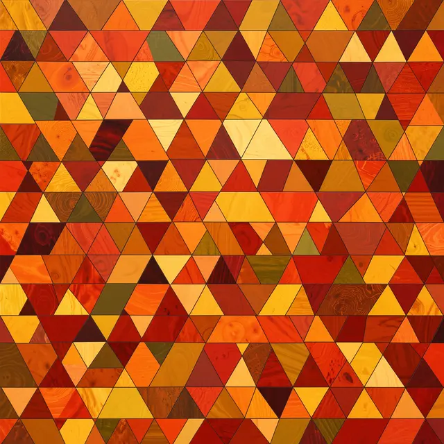 Seamless geometric mosaic of textured wood-grain triangles in warm autumn hues
