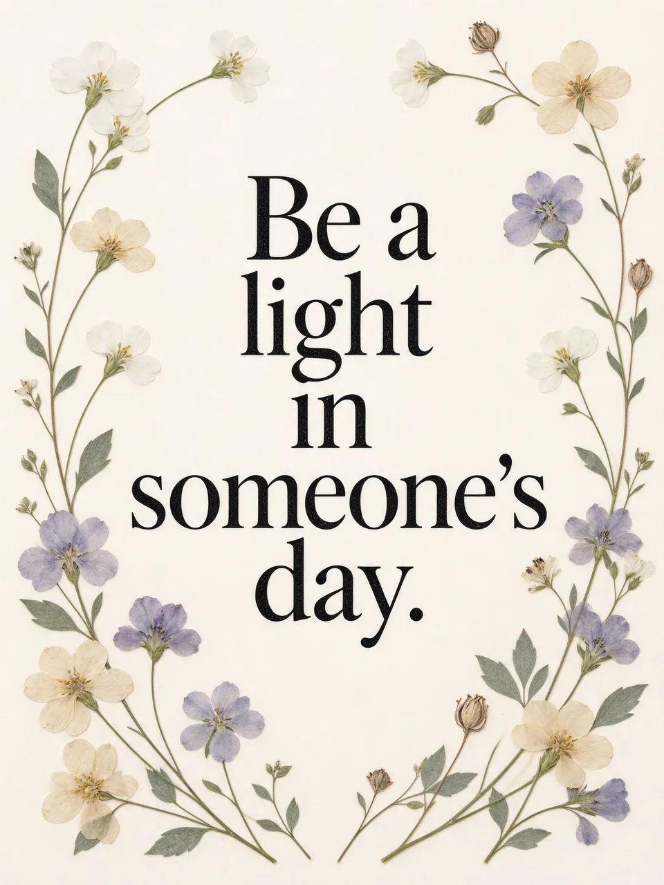 "Be a light in someone's day." text framed by delicate pressed flowers on a cream background