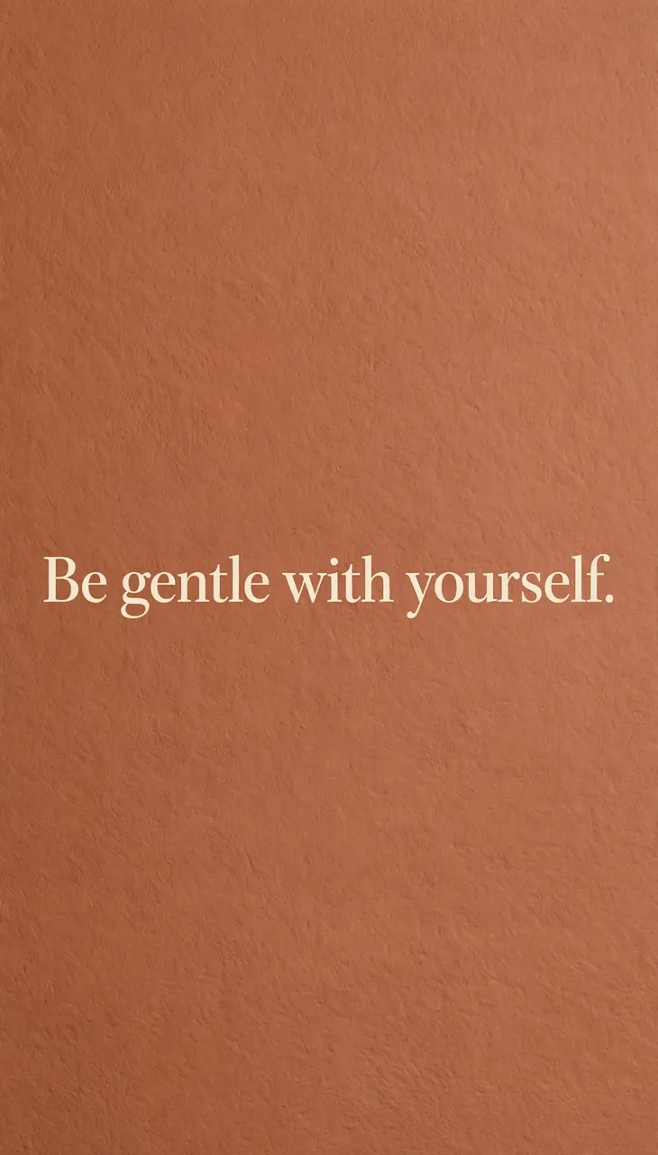The quote "Be gentle with yourself." in cream serif text centered on a warm terracotta textured phone wallpaper background