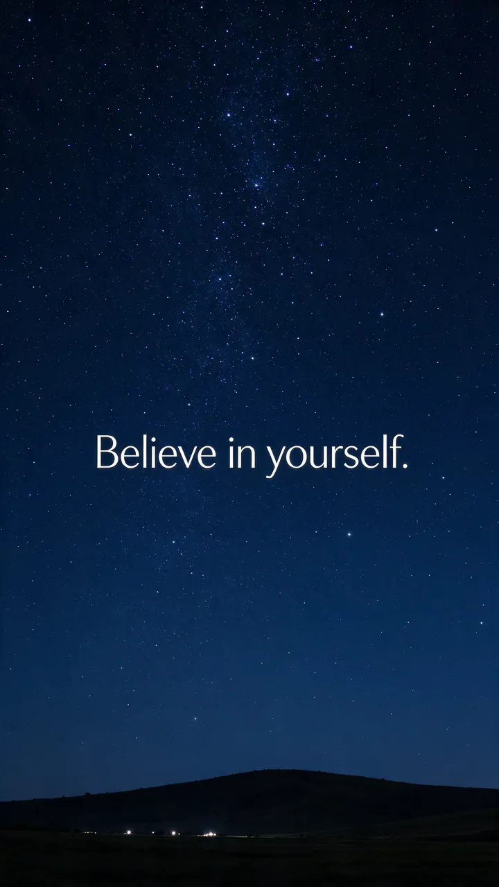Star filled night sky over a dark quiet hill with centered text reading "Believe in yourself."