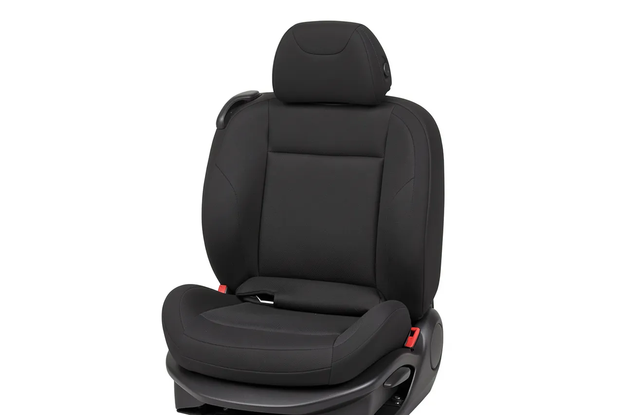 Black fabric car seat with headrest and red release latches displayed against a plain white background