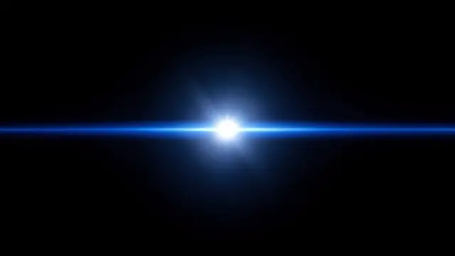 Horizontal blue anamorphic lens flare with bright white center sits on a pure black background