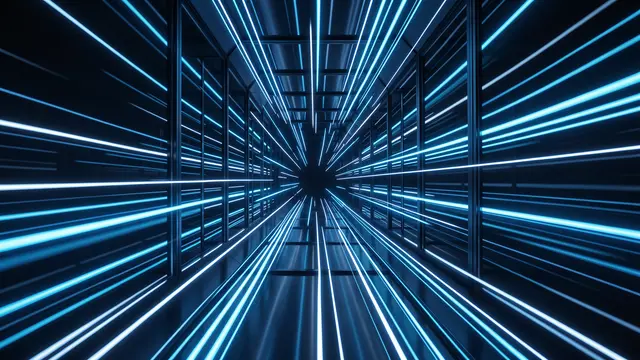 Motion-blurred electric blue light streaks race through a dark reflective geometric tunnel