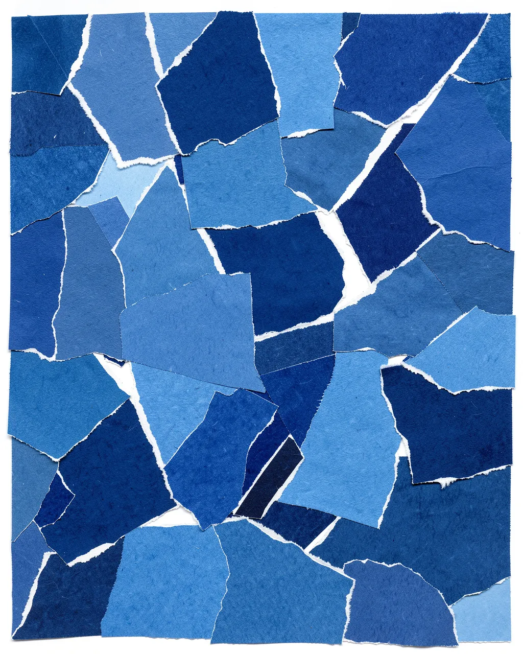 Overlapping torn paper fragments in varying shades of blue against a white background