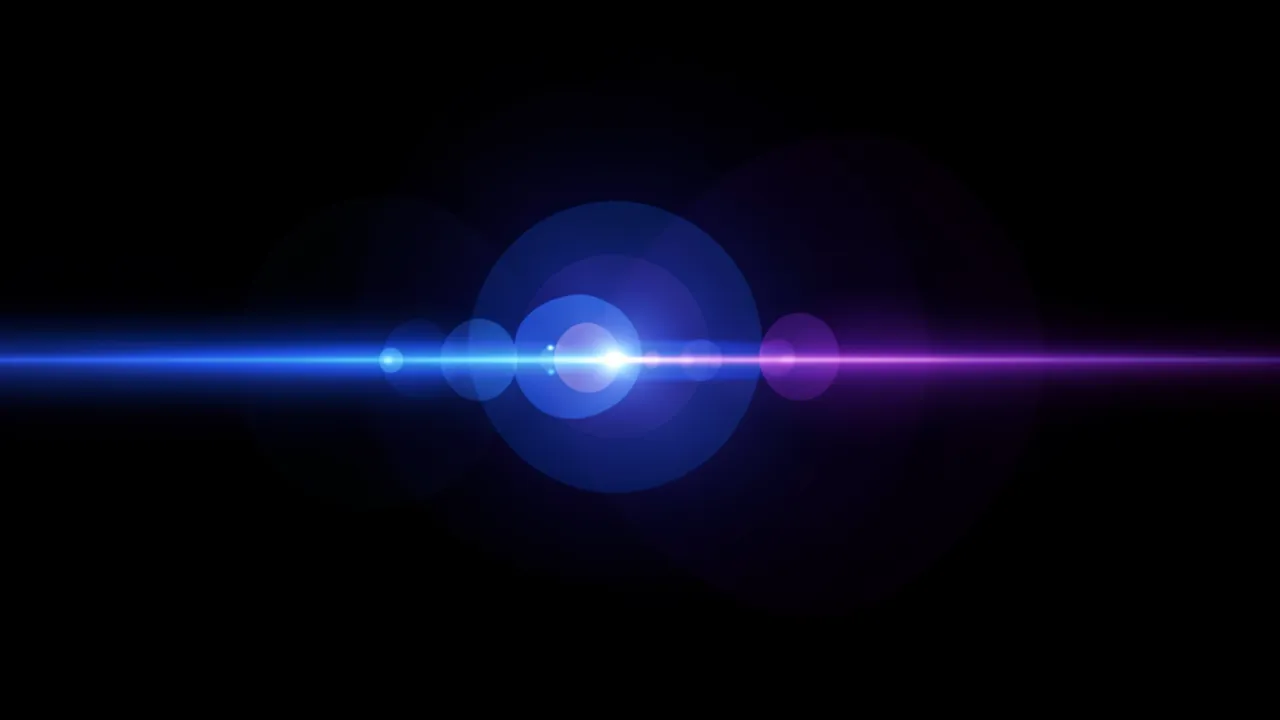 Horizontal blue to purple lens flare streak with ghost circles on a solid black background