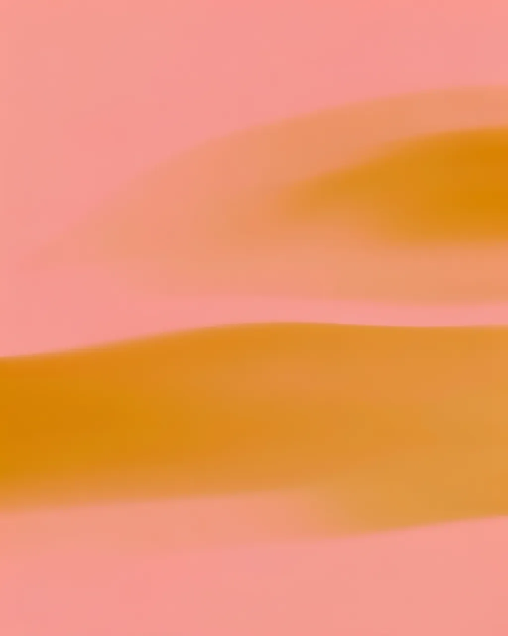 Smooth soft blended bands of blush pink and warm ochre fill the full frame