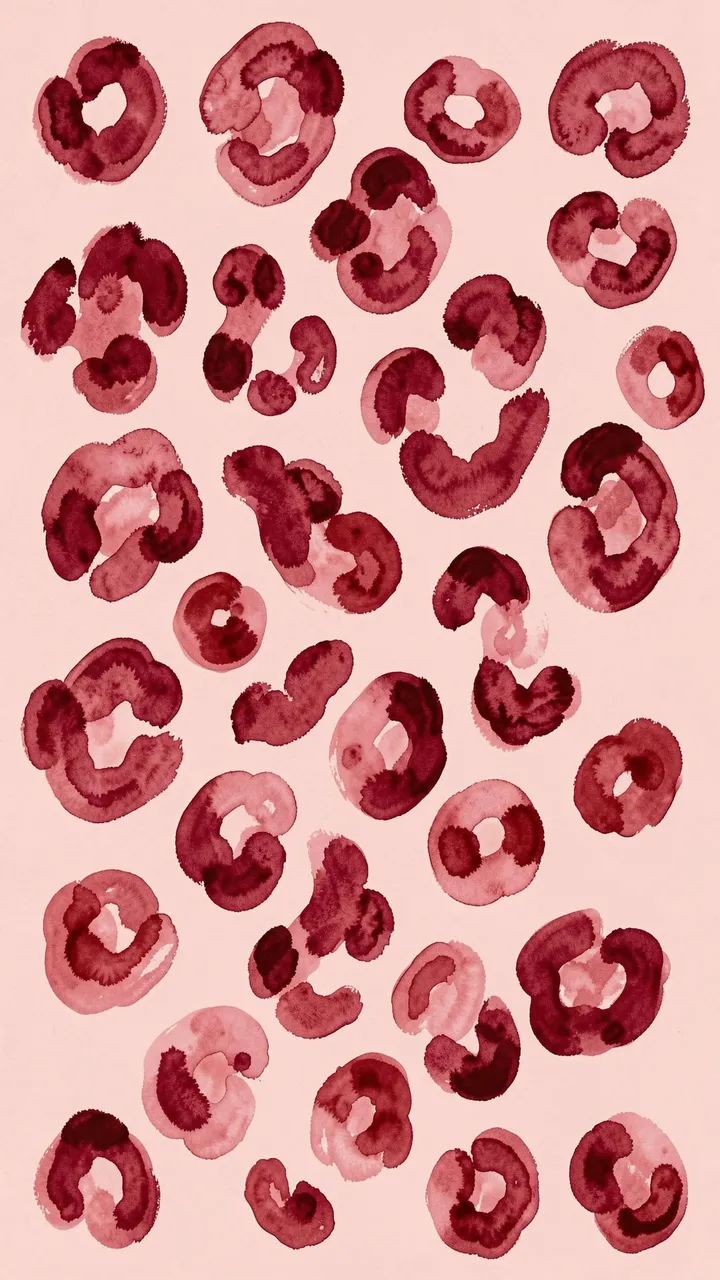 Hand-painted irregular gouache leopard rosettes arranged on a pale pink background