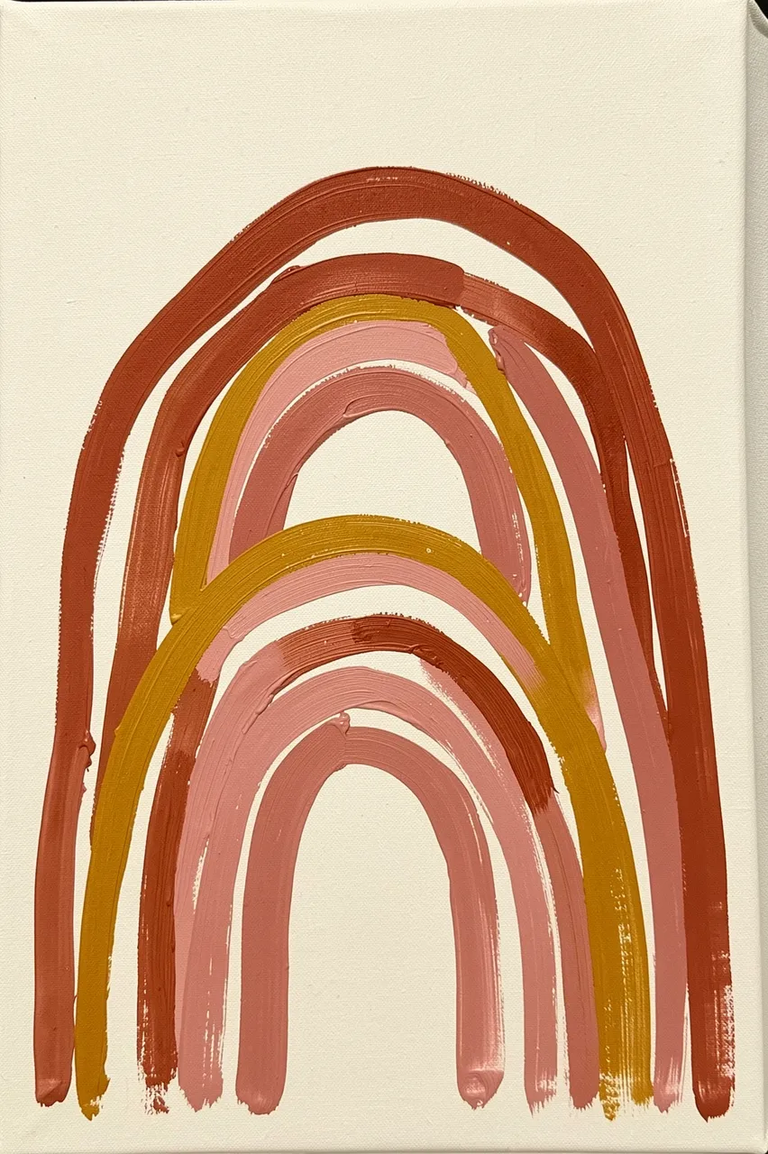 Acrylic painting of stacked boho rainbow arches in terracotta, mustard and dusty pink on cream canvas