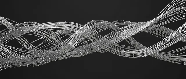 Interwoven silver particle streams stretch horizontally across a dark charcoal background