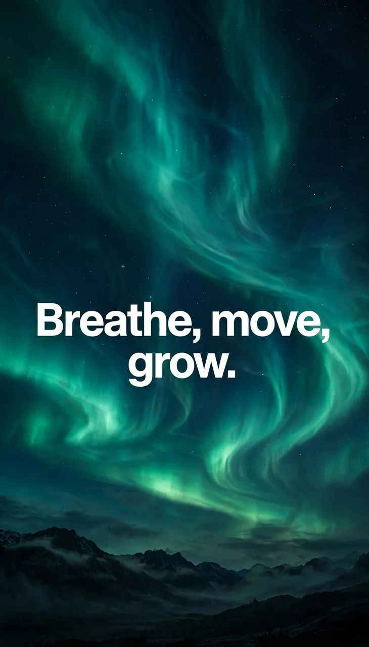 Aurora borealis night sky over misty mountains with bold white text reading "Breathe, move, grow."