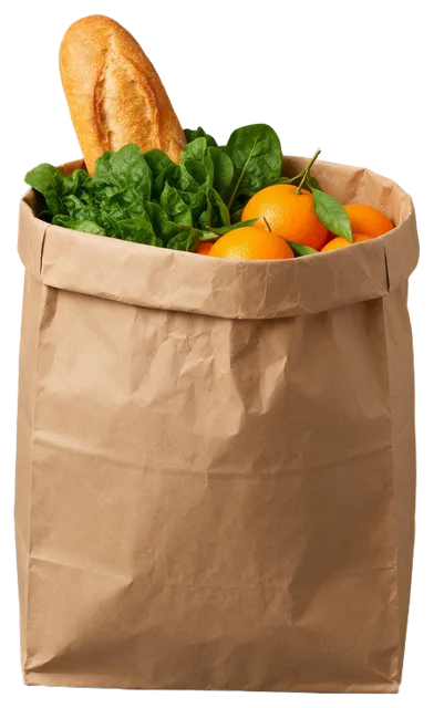 A brown paper grocery bag holds a baguette, leafy greens and fresh oranges.
