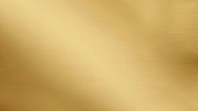 Smooth full-frame brushed gold surface with a soft subtle metallic sheen