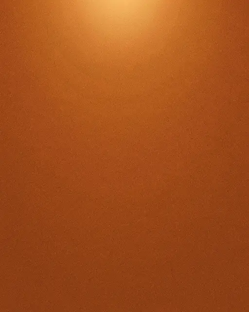 A full frame burnt orange grainy background with a soft warm glow at the top and empty copy space