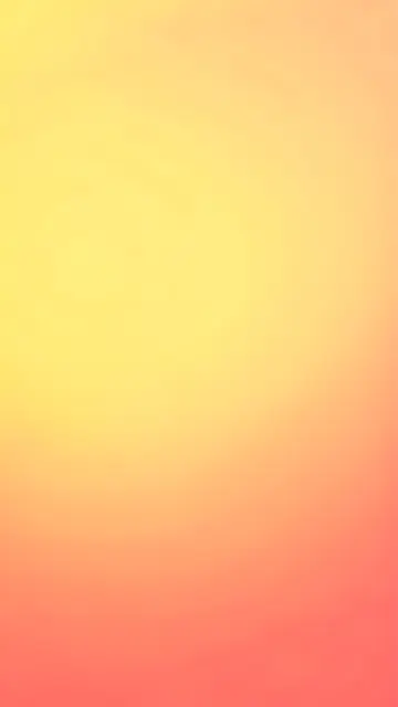 Smooth vertical hazy gradient transitioning from butter yellow at the top to soft coral at the bottom