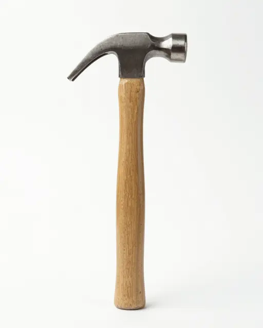 A standing upright claw hammer with a wooden hickory handle against a plain white studio background