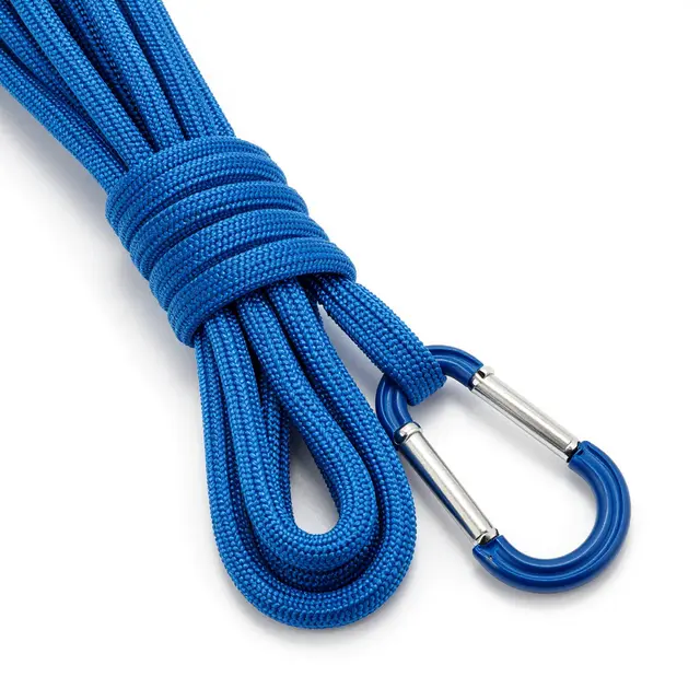 Coiled blue braided climbing rope with carabiners resting on a plain white studio background