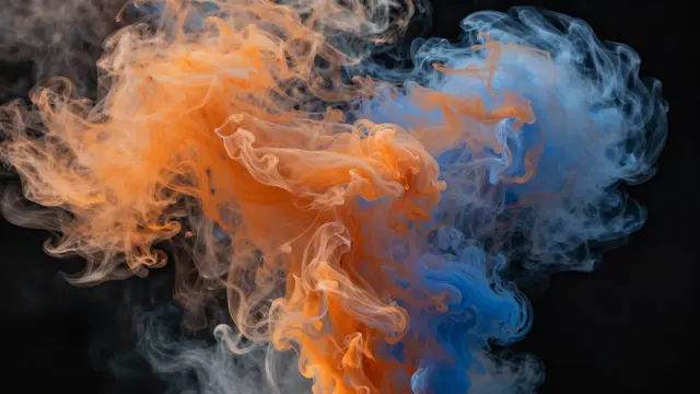 Vibrant orange and blue swirling smoke plumes mix against a solid black backdrop