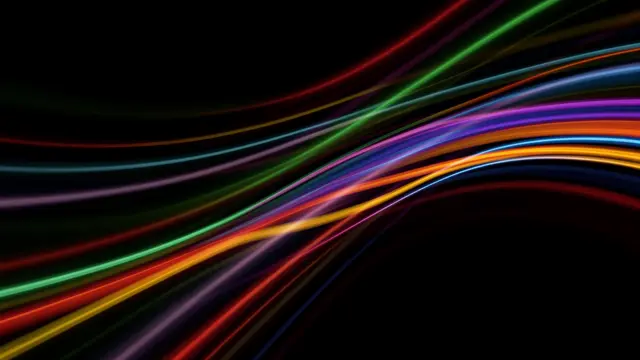 Glowing curved multicolored light streaks sweep diagonally across a solid black dark background