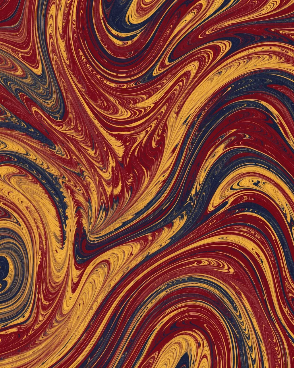 Intricate feathery combed marbled swirls in crimson, ochre, and deep indigo fill the frame