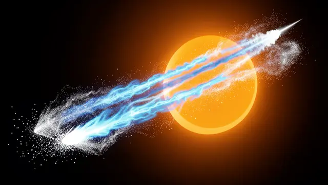 A comet with blue gas and white dust tails sweeps past a glowing orange sun in dark space
