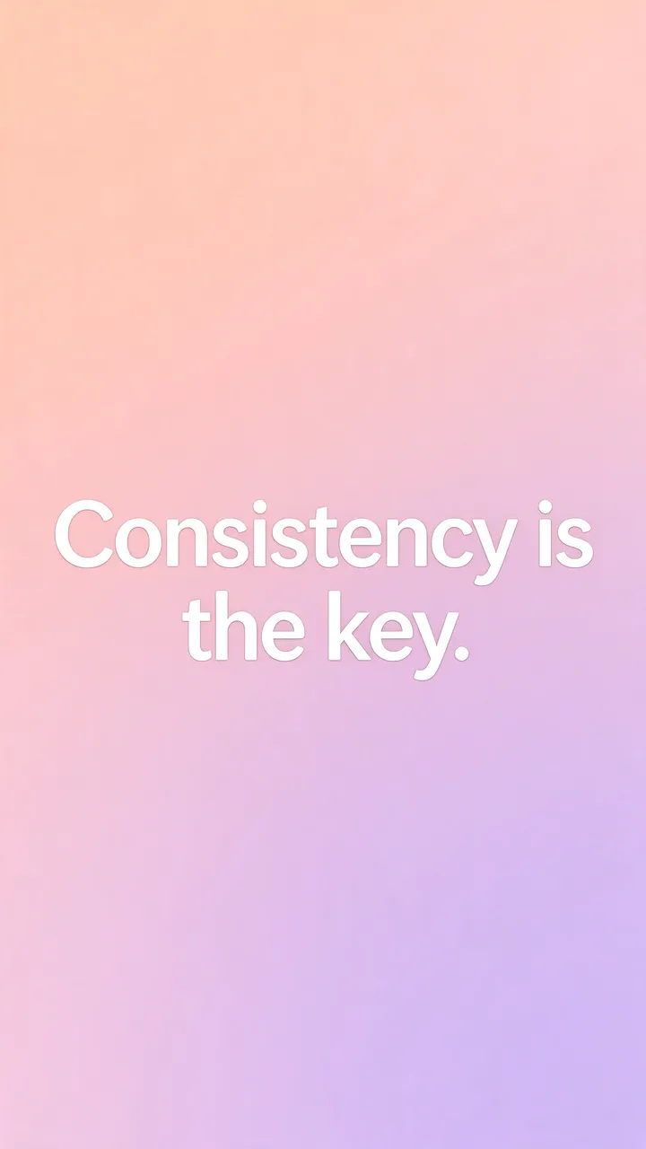 White rounded text reading "Consistency is the key." centered on a soft peach to lilac pastel gradient phone wallpaper