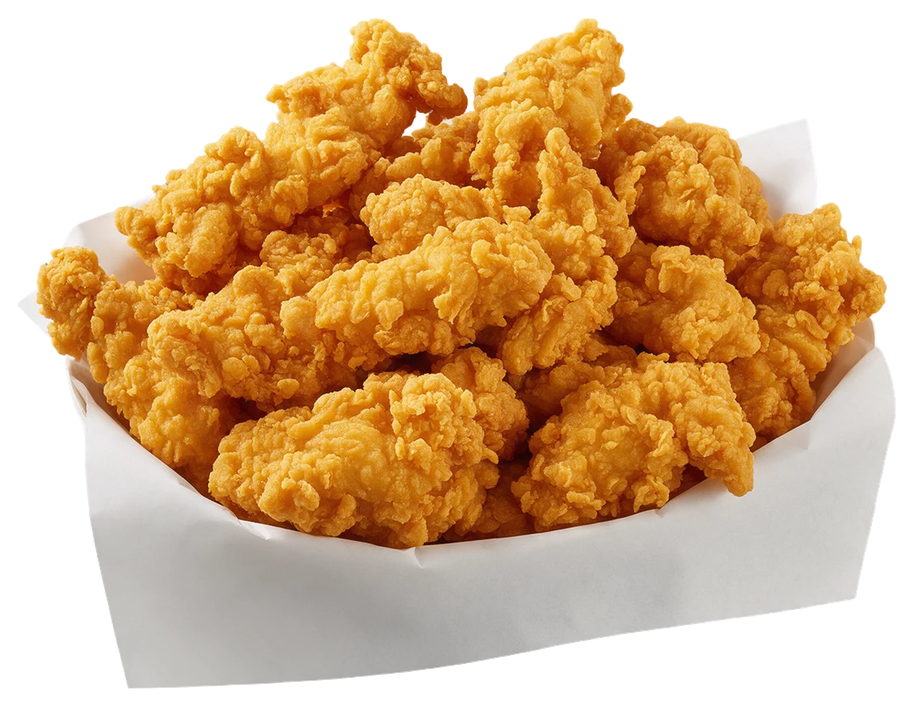 Piled golden crispy fried chicken strips sit in a plain white paper lined basket