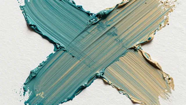 Thick textured teal and ochre paint strokes crossing over white raw canvas