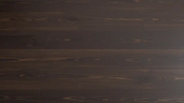 Full frame top view of dark stained wood floorboards with natural grain and subtle satin sheen