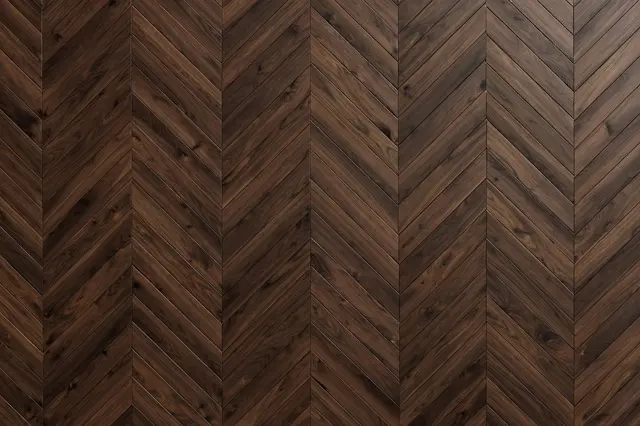 Top view of full frame dark walnut chevron parquet wood flooring filling the entire frame
