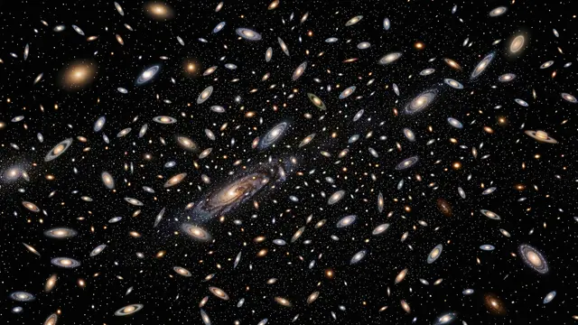 Countless spiral and elliptical galaxies scattered across the dark expanse of deep space