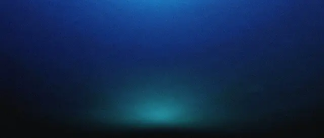 Grainy ultrawide gradient fading from deep blue to black with a faint cyan glow near the lower horizon